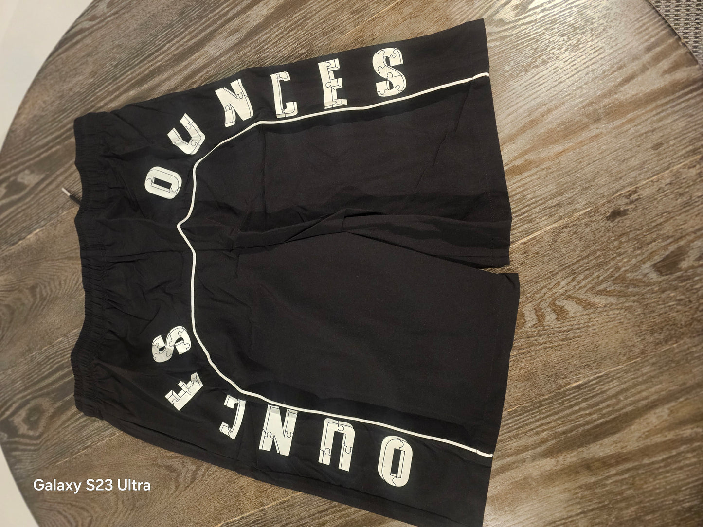 The O Black shorts