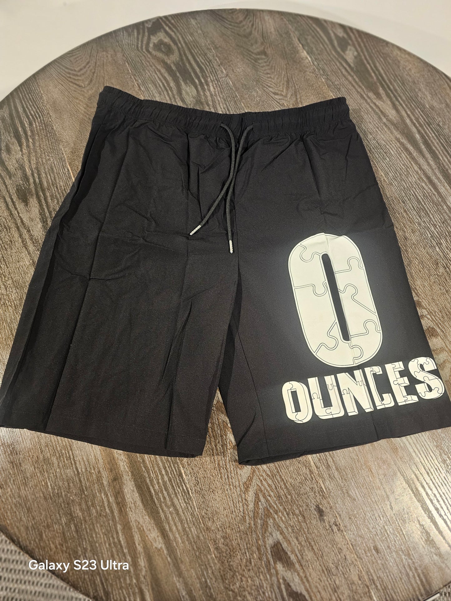 The O Black shorts